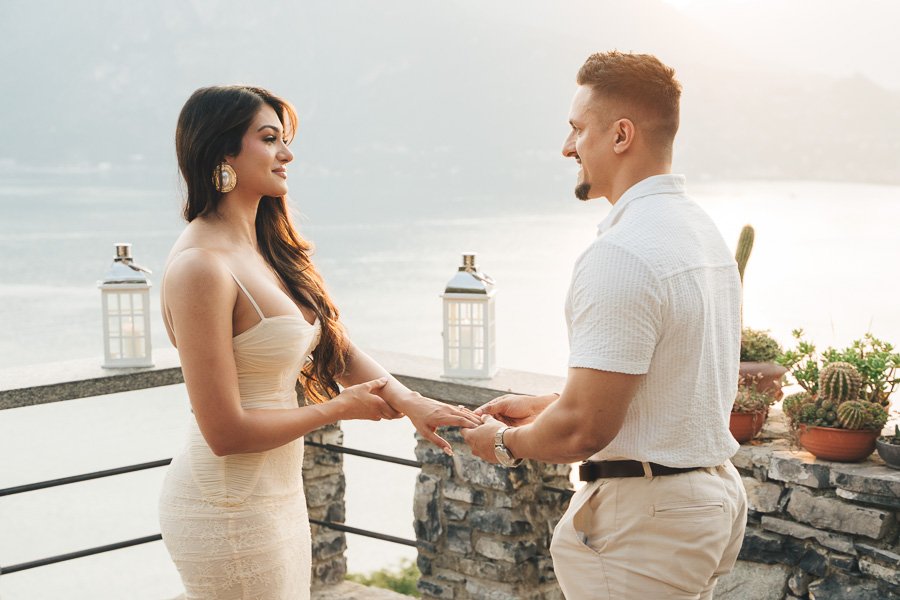 A Couple Looks At Each Other Excitedly After The Marriage Proposal at castello di vezio