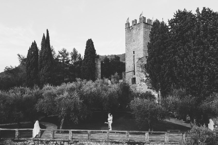 A Couple Of Engaged Couples Hug Each Other At The Castello Di Vezio