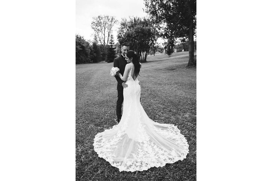 A Young Married Couple Poses Editorially during couple photo session